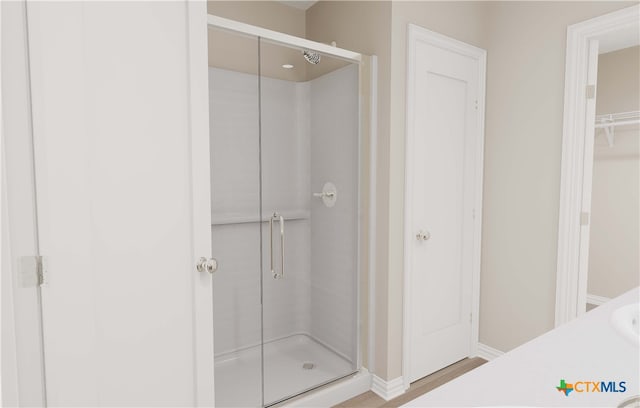 3812 Poteet Ct, Temple, TX 76504 - bathroom with baseboards and a stall shower