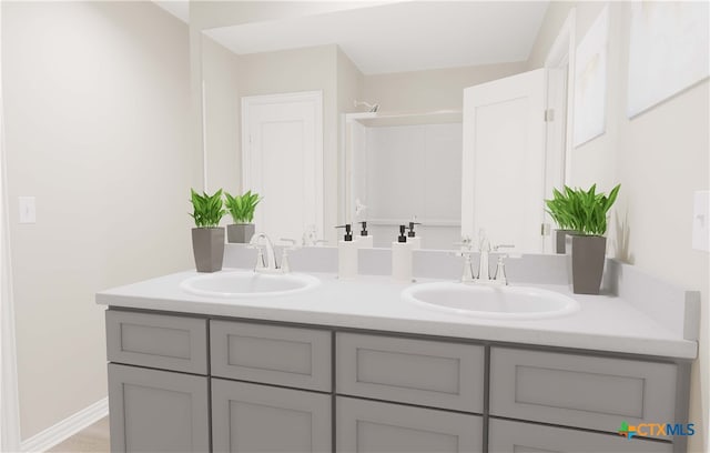 3812 Poteet Ct, Temple, TX 76504 - bathroom featuring a sink, a shower, and double vanity