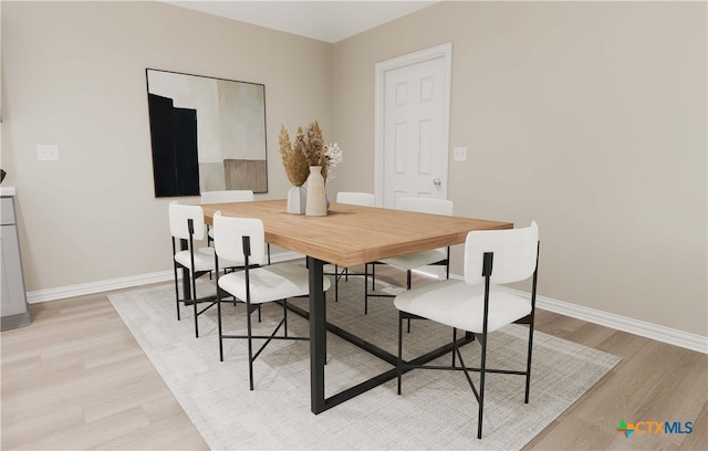 3812 Poteet Ct, Temple, TX 76504 - dining room with light wood-style flooring and baseboards