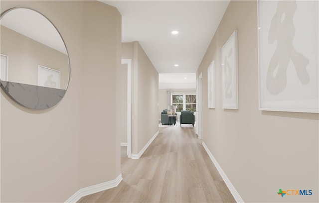 3812 Poteet Ct, Temple, TX 76504 - hallway with recessed lighting, light wood-style flooring, and baseboards