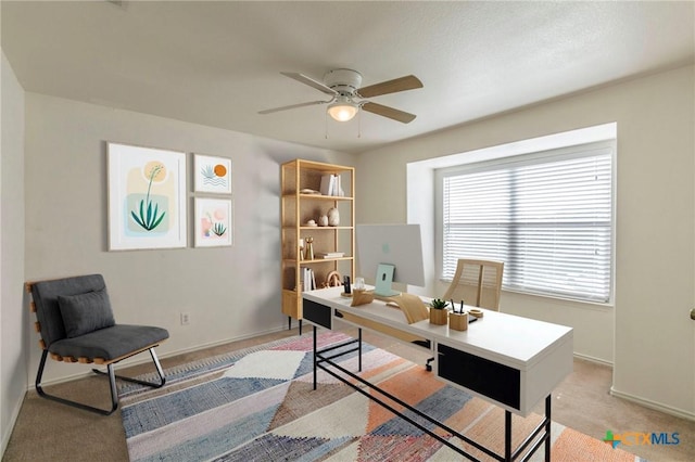 425 Starview St, Temple, TX 76502 - home office featuring light colored carpet, baseboards, and a ceiling fan
