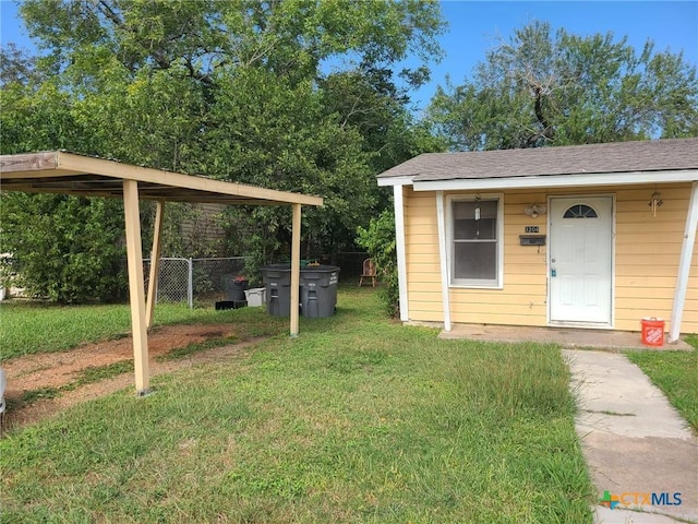 view of outdoor structure with an outdoor structure and fence