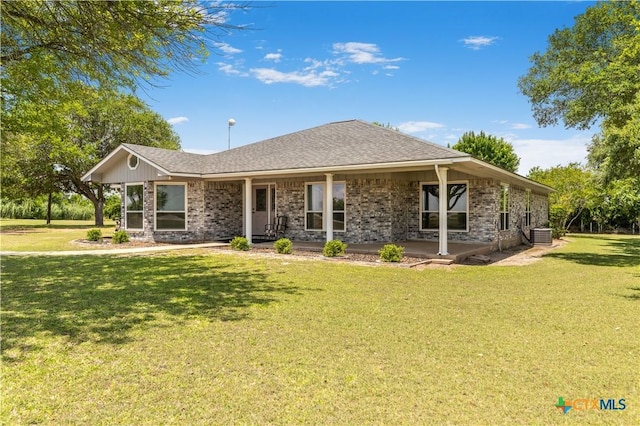 2460 N State Highway 95, Moulton, TX 77975 - single story home with a front lawn, brick siding, and roof with shingles