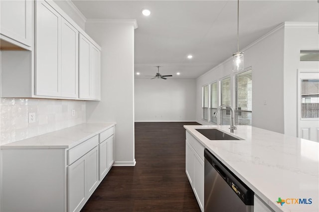 kitchen with decorative backsplash, a ceiling fan, light stone countertops, stainless steel dishwasher, and a sink