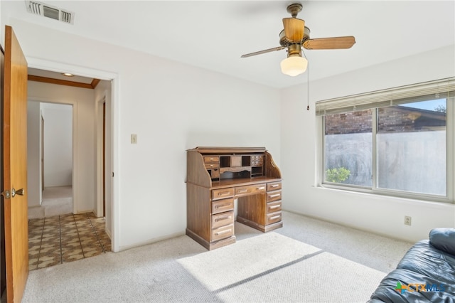 office featuring ceiling fan and light colored carpet