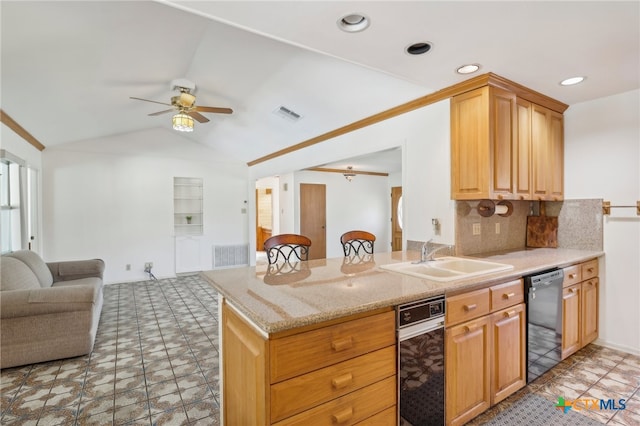 kitchen with decorative backsplash, ceiling fan, sink, black dishwasher, and lofted ceiling