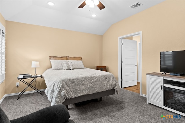 bedroom featuring vaulted ceiling, carpet flooring, and ceiling fan