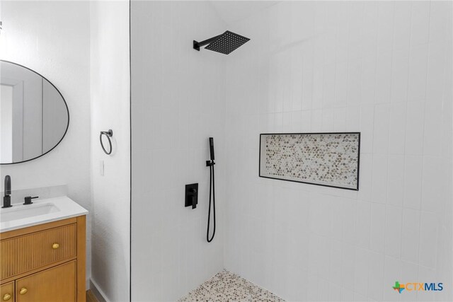 1701 Southwestern Trl, Round Rock, TX 78664 - full bathroom with a tile shower and vanity