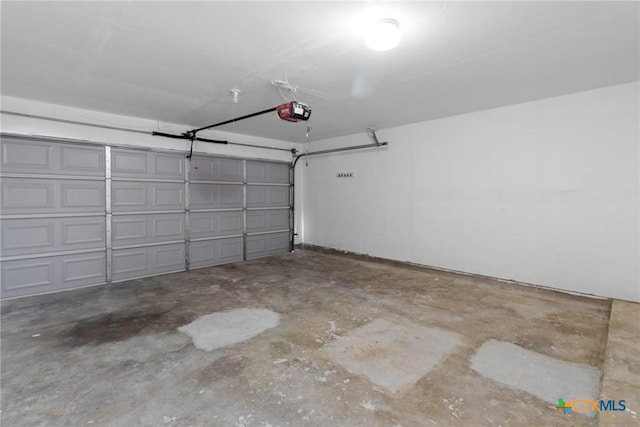 1701 Southwestern Trl, Round Rock, TX 78664 - garage featuring a garage door opener