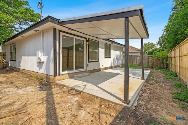 1701 Southwestern Trl, Round Rock, TX 78664 - back of house with a patio and a fenced backyard