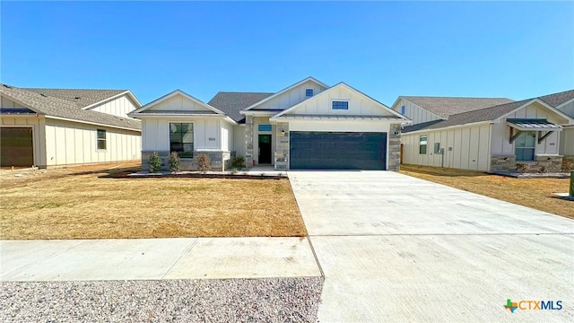 1486 Walker Place Blvd, Copperas Cove, TX 76522 - modern farmhouse featuring a standing seam roof, a garage, driveway, a front lawn, and board and batten siding