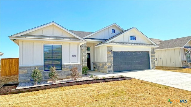 1486 Walker Place Blvd, Copperas Cove, TX 76522 - view of front facade with board and batten siding, a standing seam roof, metal roof, a garage, and driveway