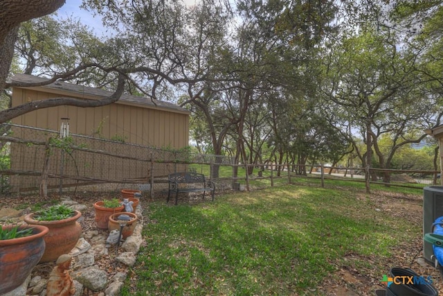 view of yard featuring a fenced backyard