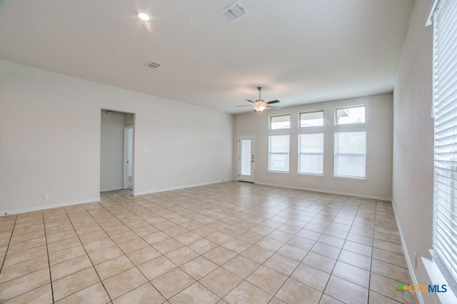 2241 Windswept Way, New Braunfels, TX 78132 - spare room with ceiling fan, light tile patterned floors, and baseboards