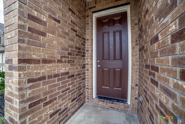2241 Windswept Way, New Braunfels, TX 78132 - view of exterior entry featuring brick siding