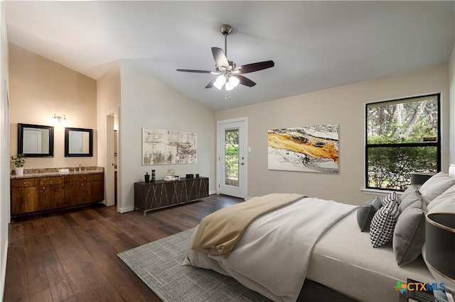 1143 Flaman Rd, Canyon Lake, TX 78133 - bedroom with vaulted ceiling, access to exterior, dark wood-type flooring, ensuite bathroom, and ceiling fan