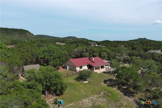 1143 Flaman Rd, Canyon Lake, TX 78133 - aerial overview of property's location featuring a forest
