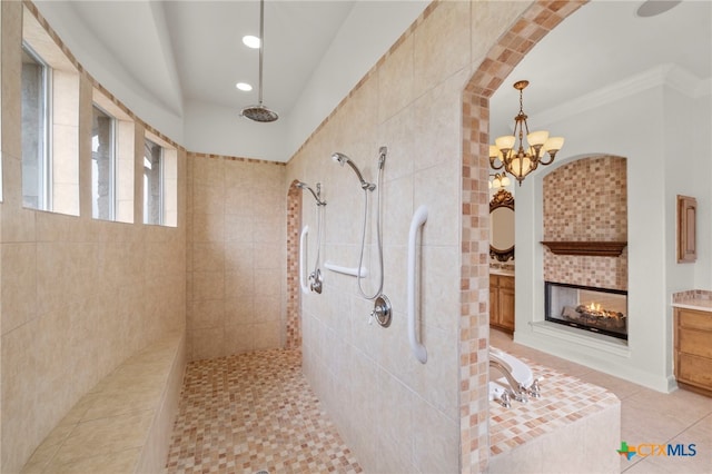 bathroom featuring an inviting chandelier, a walk in shower, a bath, crown molding, and recessed lighting