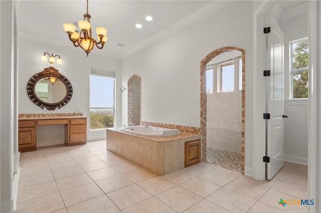 bathroom with ornamental molding, tile patterned flooring, a walk in shower, a notable chandelier, and a garden tub
