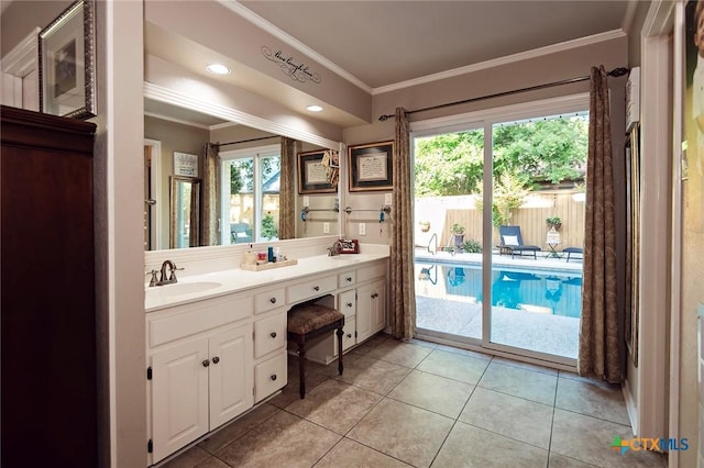 3501 Grizzly Bear Trl, Temple, TX 76502 - bathroom featuring crown molding, plenty of natural light, tile patterned floors, and double vanity