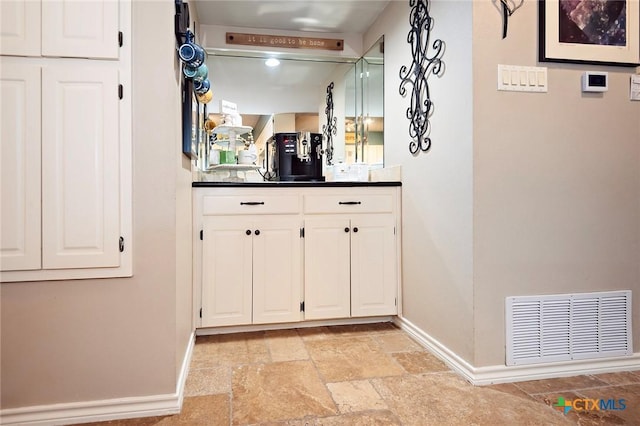 3501 Grizzly Bear Trl, Temple, TX 76502 - hallway with baseboards and stone tile floors
