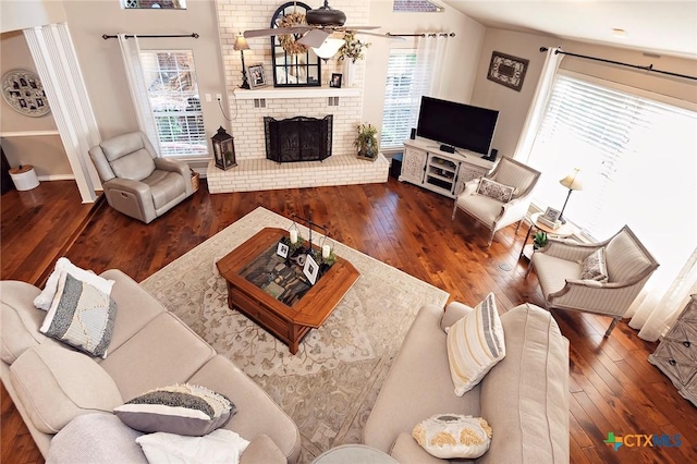 3501 Grizzly Bear Trl, Temple, TX 76502 - living room with hardwood / wood-style flooring, ceiling fan, and a fireplace