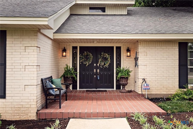 3501 Grizzly Bear Trl, Temple, TX 76502 - entrance to property with roof with shingles, brick siding, and a porch