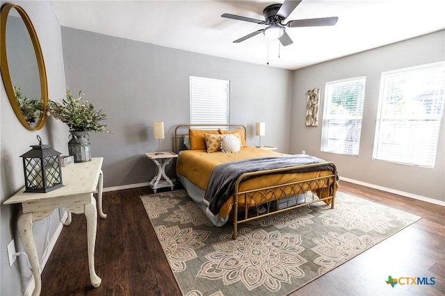 1210 N Milam St, Seguin, TX 78155 - bedroom featuring wood finished floors and a ceiling fan