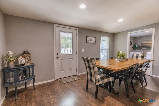 1210 N Milam St, Seguin, TX 78155 - dining space with washer and dryer, dark wood-style floors, and recessed lighting