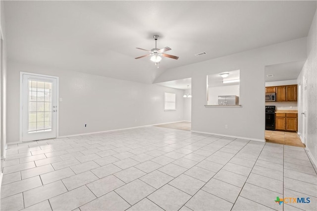 503 Chrislyn St, Troy, TX 76579 - unfurnished living room featuring ceiling fan, light tile patterned flooring, and vaulted ceiling