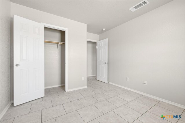 503 Chrislyn St, Troy, TX 76579 - unfurnished bedroom featuring light tile patterned flooring and a closet