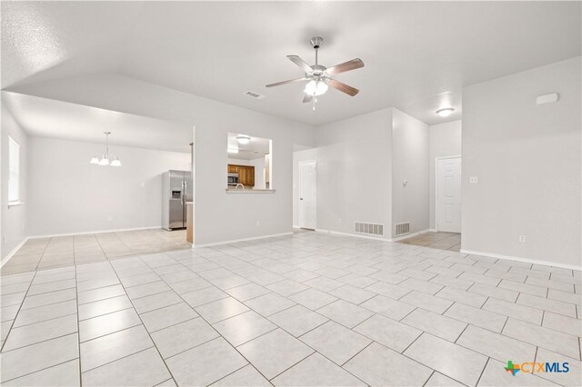 503 Chrislyn St, Troy, TX 76579 - unfurnished living room featuring a ceiling fan, light tile patterned floors, and a chandelier