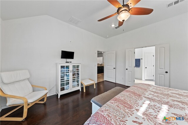 bedroom featuring ceiling fan, dark wood-type flooring, and high vaulted ceiling