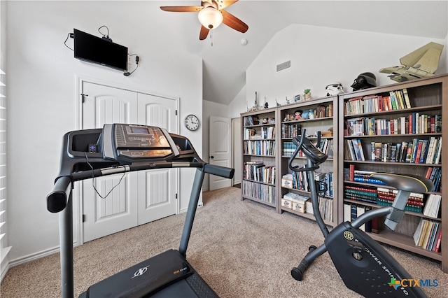 workout room featuring carpet flooring, ceiling fan, and lofted ceiling