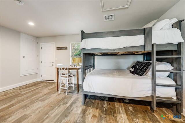 bedroom featuring hardwood / wood-style flooring