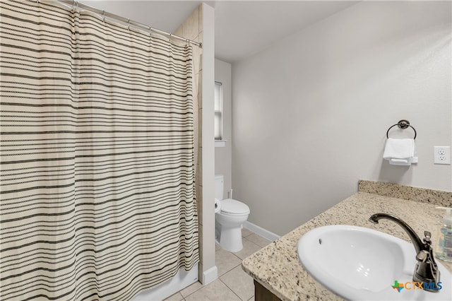 bathroom with tile patterned floors, vanity, toilet, and a shower with shower curtain