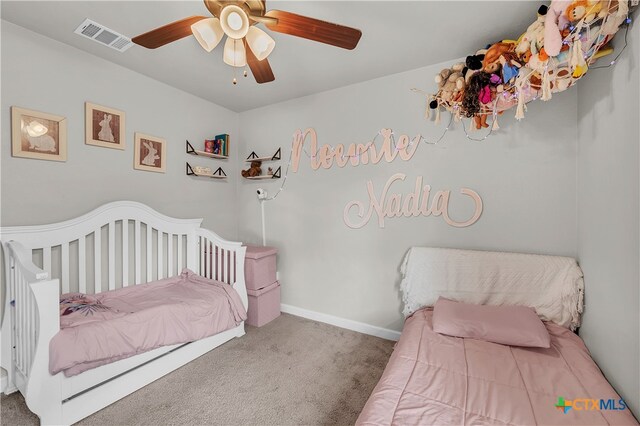 bedroom with ceiling fan and carpet floors