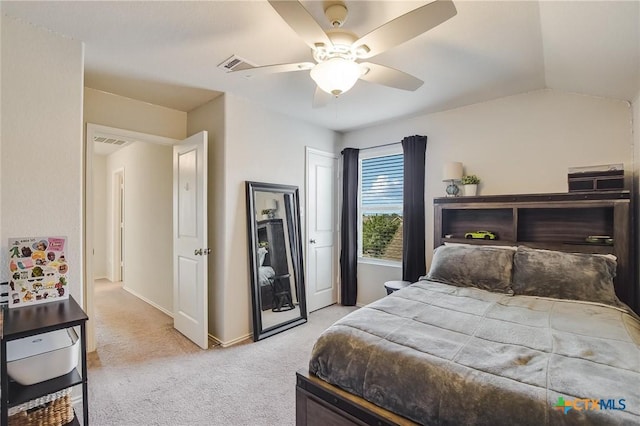 272 Adoquin Trl, Buda, TX 78610 - bedroom featuring light carpet, baseboards, ceiling fan, and lofted ceiling