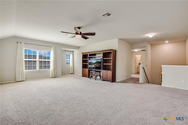 272 Adoquin Trl, Buda, TX 78610 - living area with a ceiling fan, light carpet, and baseboards