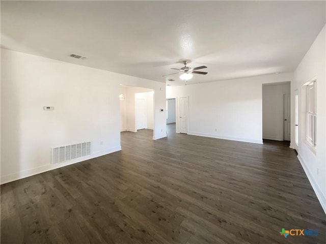 5004 Imperial Eagle Dr, Killeen, TX 76549 - spare room featuring ceiling fan, visible vents, baseboards, and dark wood finished floors