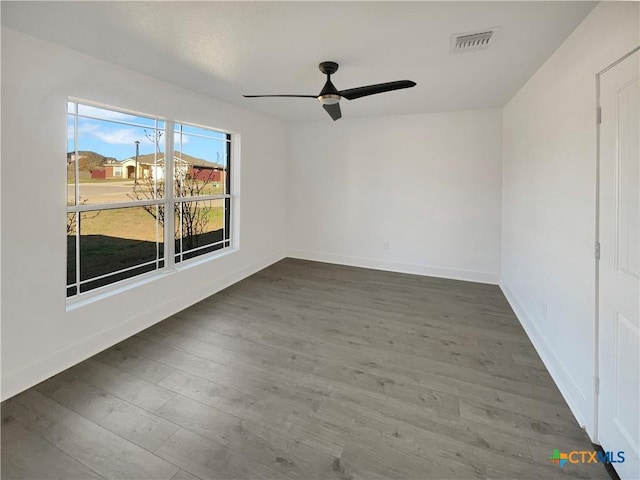5004 Imperial Eagle Dr, Killeen, TX 76549 - unfurnished room with a ceiling fan, wood finished floors, visible vents, and baseboards