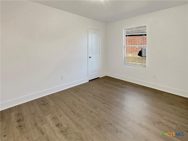 5004 Imperial Eagle Dr, Killeen, TX 76549 - unfurnished room with wood finished floors and baseboards