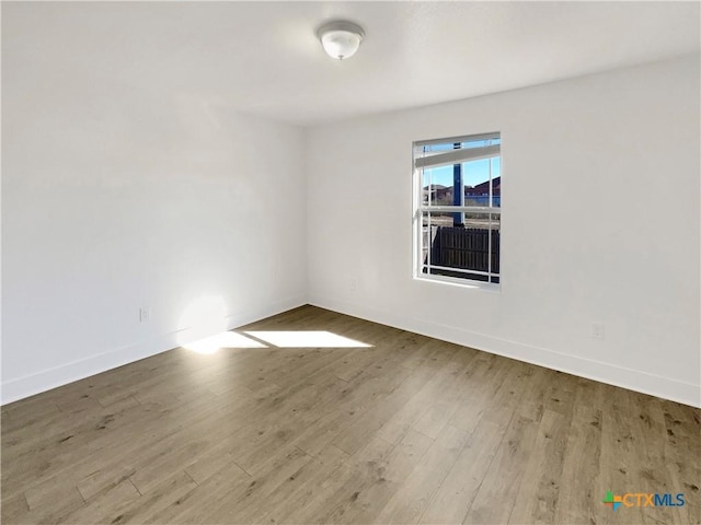 5004 Imperial Eagle Dr, Killeen, TX 76549 - empty room featuring baseboards and wood finished floors