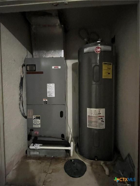 utilities featuring water heater and heating unit