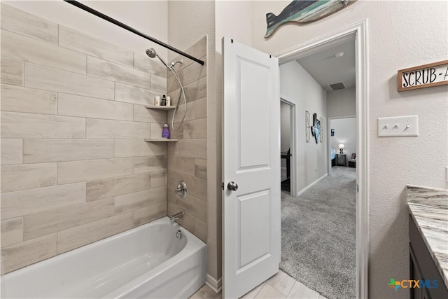 810 Mclaury Cv, Killeen, TX 76542 - full bath featuring shower / bathing tub combination, visible vents, vanity, baseboards, and a textured wall
