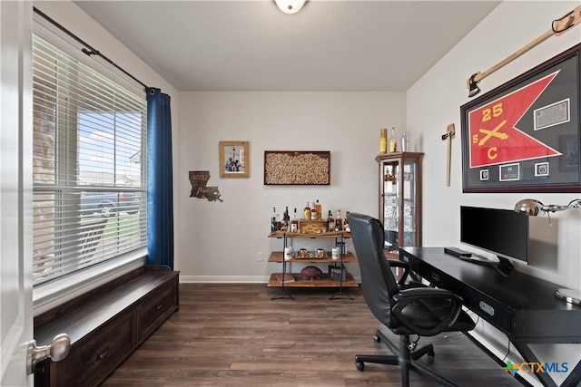 810 Mclaury Cv, Killeen, TX 76542 - office featuring baseboards, visible vents, and dark wood-style floors