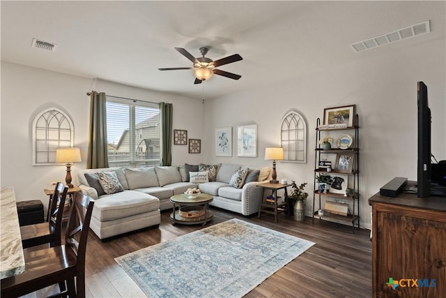 810 Mclaury Cv, Killeen, TX 76542 - living area featuring a ceiling fan, dark wood-style flooring, and visible vents