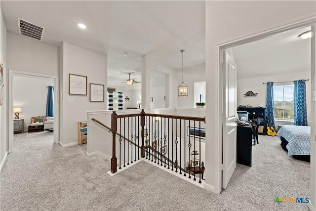 810 Mclaury Cv, Killeen, TX 76542 - hallway featuring visible vents, carpet floors, baseboards, an upstairs landing, and recessed lighting