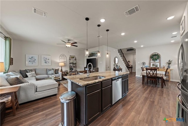 810 Mclaury Cv, Killeen, TX 76542 - kitchen featuring open floor plan, appliances with stainless steel finishes, a sink, and visible vents