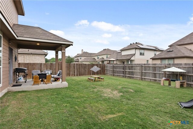 810 Mclaury Cv, Killeen, TX 76542 - view of yard with a patio, a residential view, and a fenced backyard